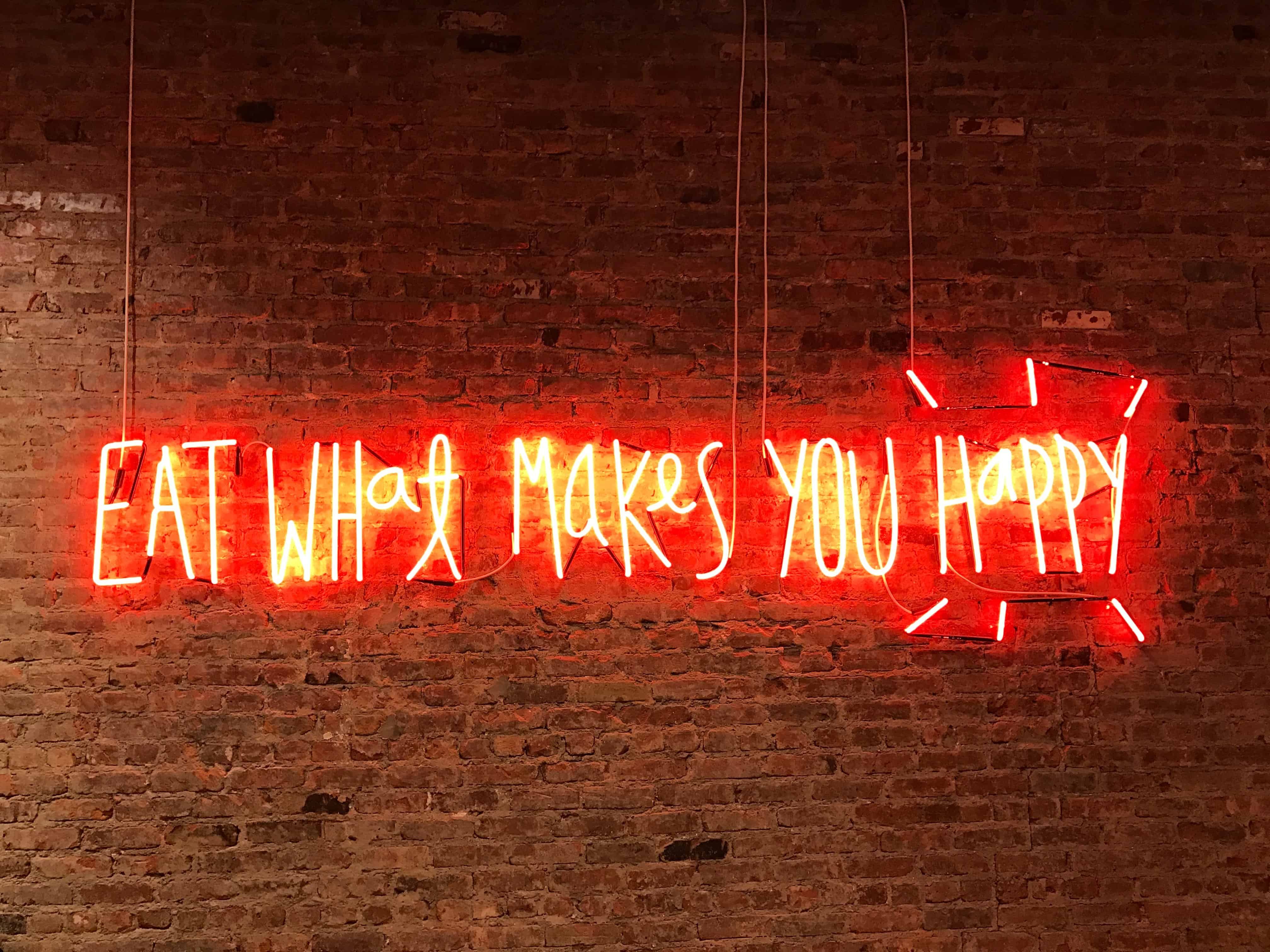 Eat what makes you happy neon sign